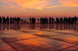 People silhouette on golden sunset in Zadar, Dalmatia, Croatia