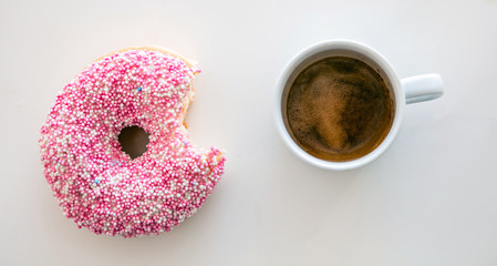 Wall Mural - Doughnut and coffee cup isolated on white color background. Top view