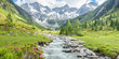 canvas print picture - Panorama eines Wandergebietes in den Alpen mit Wildbach und Gletscher im Hintergrund