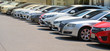 © Amphon - Closeup of front side of  cars parking in outdoor parking lot beside the street in bright sunny day.