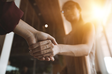 Businesswoman shaking hands, finishing up a meeting business growth.Confidence concept