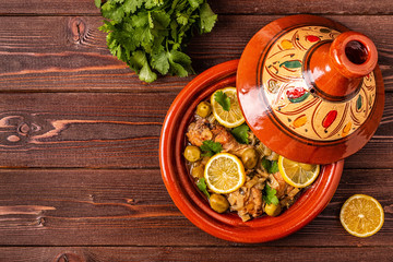 Wall Mural - Traditional moroccan tajine of chicken with salted lemons, olives