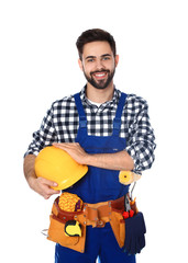 Wall Mural - Portrait of construction worker with tool belt on white background