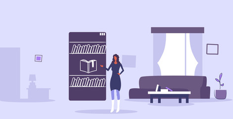 Poster - woman using mobile app online librbary e-books in smartphone e-learning concept girl choosing book modern living room interior horizontal full length