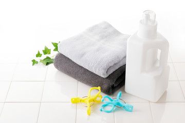 洗濯　Detergent bottle on white tile