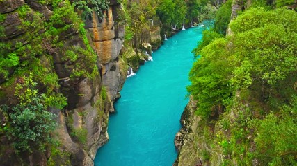 Canvas Print - River flowing between canyon and forest. Manavgat, Antalya, Turkey. Blue river. Rafting tourism.