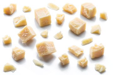 Wall Mural - Parmesan cheese cubes and parmesan crumbs isolated on white background.