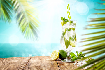 Summer drink on beach and sea landscape 