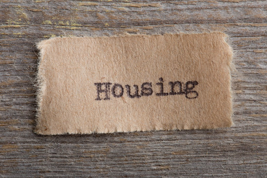 Housing typed text on a paper, real estate concept