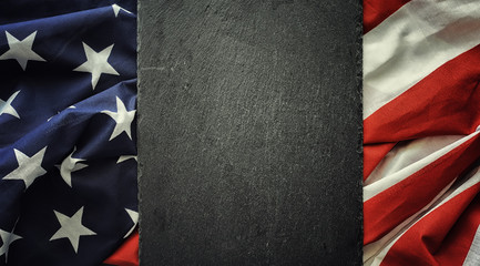 American flag on a black background. Space for text.