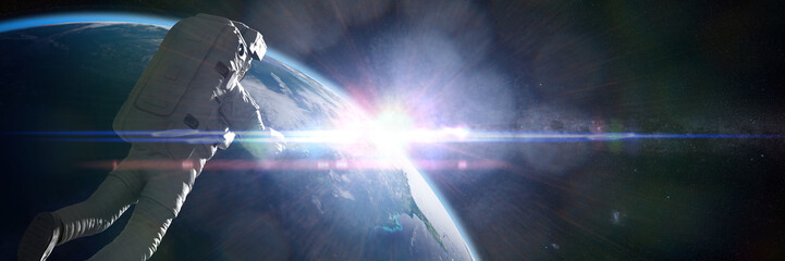 Wall Mural - astronaut in orbit of planet earth