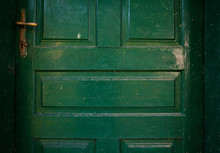 Details Of An Old Green Wooden Doors
