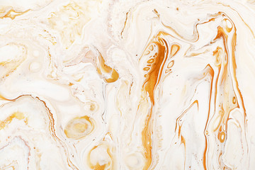 Caramel dynamic and fluid raster texture. Abstract acrylic paints mixt color background. Dyeing, liquid flow surface modern design. Orange and white contrast pigments, watercolor wallpaper.