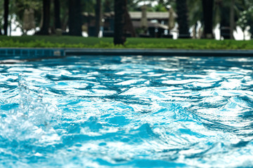 Blue clear fresh Water in jacuzzi. Spa massage background. azure color