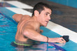 © herraez - swimmer going out of the swimming pool .