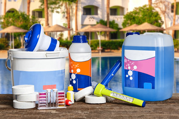 Equipment with chemical cleaning products and tools for the maintenance of the swimming pool.