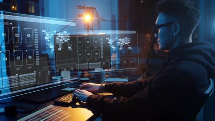 Poster - cybercrime, hacking and technology concept - asian male hacker in dark room writing code or using computer virus program for cyber attack