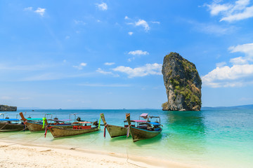 Wall Mural - beautiful crystal clear turquoise blue sea and boats at ko poda island, ao phra nang bay, krabi, tha