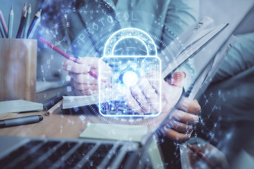 Poster - Multi exposure of woman's hands making notes with lock icon. Concept of security and protection of data