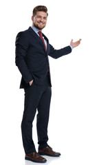 Sticker - Positive businessman presenting and holding his hand in his pocket