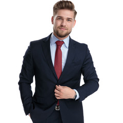 Canvas Print - Determined businessman unbuttoning his jacket