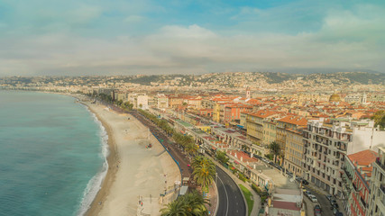 Poster - time lapse city view. Embankment, sea, beach and buildings in nice france. Azure coast on a sunny day. People walking on seafront cars driving on the road.