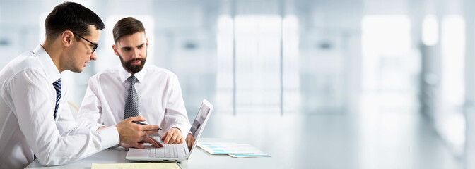 Businessmen working in an office