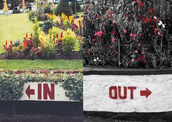 A split screen picture of an in and an out sign painted onto a wall. Perfect for use in trend blogs and the like, or to support an newspaper article.