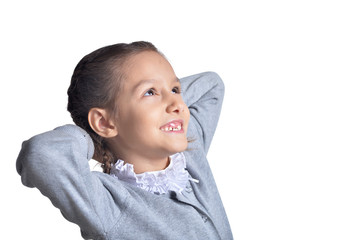 Wall Mural - Portrait of cute little girl looking away on white background