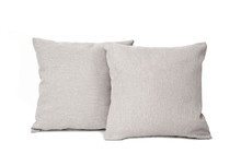 Gray Cushions Against White Wall Side View. Soft Square Pillow Isolated On White.
