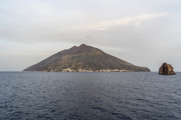 Poster - The majestic Eolian island of Stomboli view from the sea, active volcano in Italy