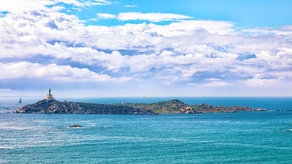 Wall Mural - Fantastic view of Capo Carbonara lighthouse with turquoise water.