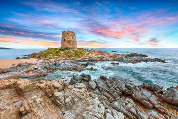 Wall Mural - Fantastic sunset view of Bari Sardo tower in the Gulf of Orosei.