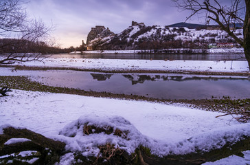 Wall Mural - Snow Covered Devin Castle Ruins above the Danube River in Bratislava, Slovakia in the Morning