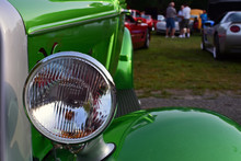 Head Light And Fender Of Green Antique Car At Cruise USA 