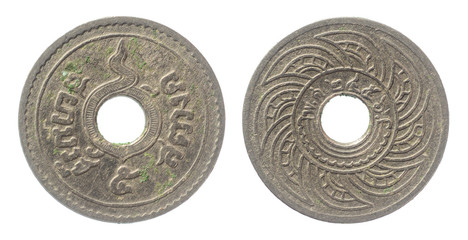 isolated of 1913 old Thai coin on white background. In the reign of King Rama VI of Siam