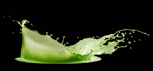 green paint splash isolated on black background