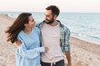© Drobot Dean - Beautiful young smiling couple spending time at the beach