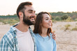 © Drobot Dean - Beautiful young smiling couple spending time at the beach