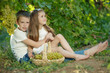© nuzza11 - Child with grapes on nature.