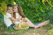 © nuzza11 - Child with grapes on nature.