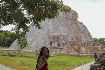 Wall Mural - Girl in mayan ruins of the ancient city in Uxmal, Yucatan, Mexico