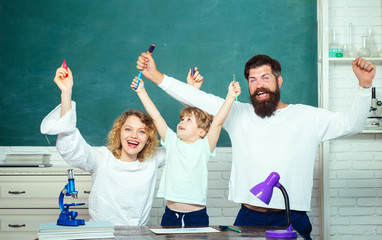 Parent taking child to school. Family school partnership. Home Family math schooling - Parents teaching kids private lessons in math. Family school partnerships examples.
