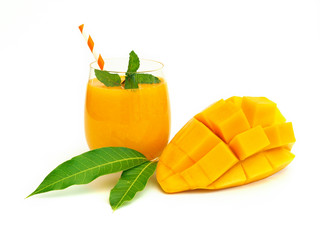 Wall Mural - Fresh mango smoothies glass and ripe mango on white background for healthy summer drinks concept.