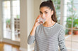 © Krakenimages.com - Beautiful young woman drinking a fresh glass of water at home