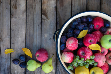 Wall Mural - Fruits on a wooden background