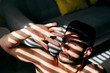 © Manuel Ruiz Alba/ADDICTIVE STOCK - From above young naked handsome male with stylish hairstyle standing near sofa and covering sunlight with hand