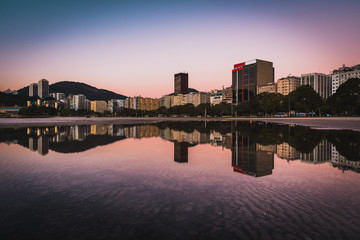 Fototapete - Panoramic View of Buildings Reflected on Water in Botafogo, Rio de Janeiro, Brazil