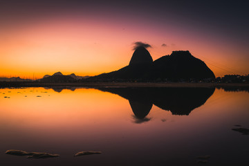 Fototapete - View of the Sugarloaf Mountain Reflected on Water by Sunrise, in Rio de Janeiro, Brazil