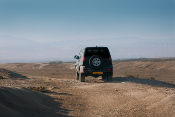 Off road car drive at the desert